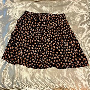 brandy Melville mini skirt, says one size but would say they are small or xsmall